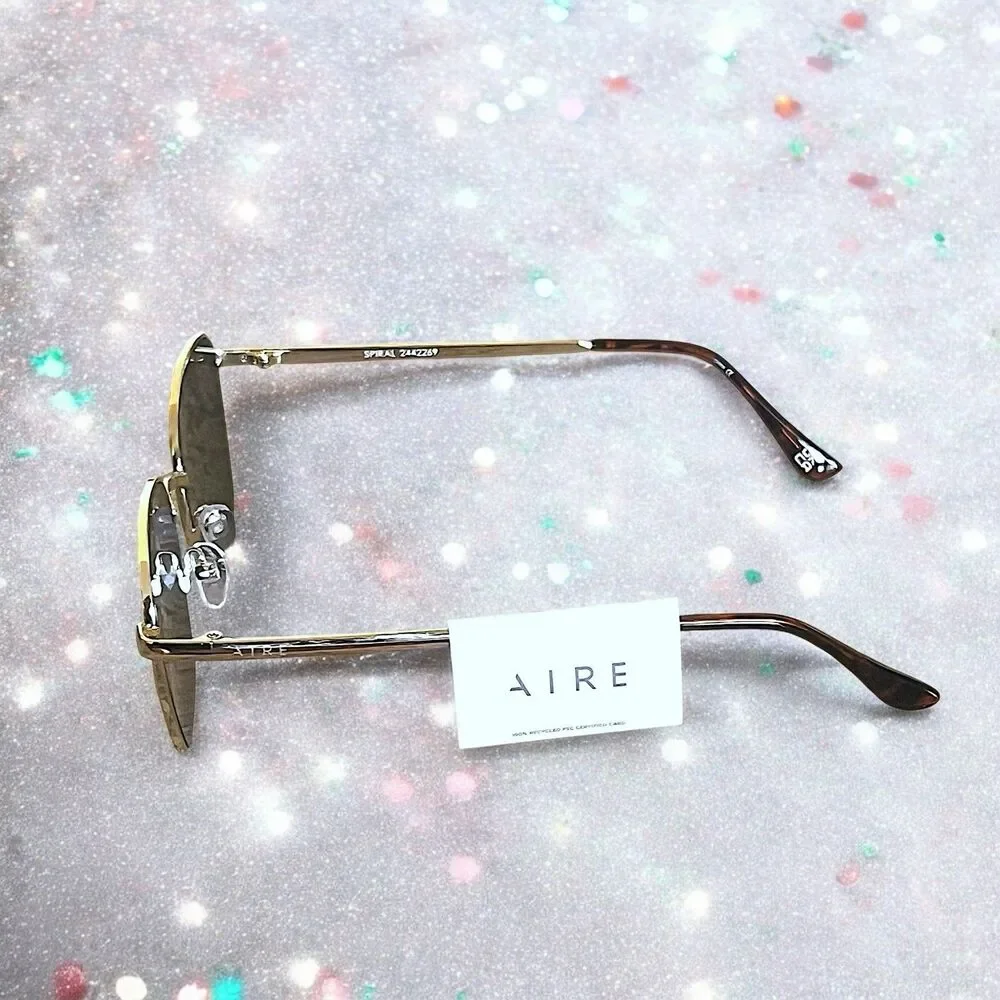 AIRE Women's Spiral Sunglasses in Gold Brand New With Tags